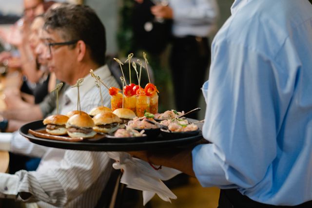 Guest adding extra items to a buffet order