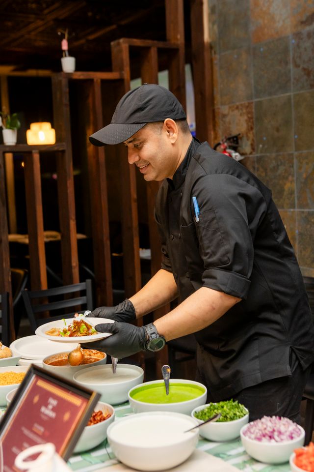 Restaurant staff preparing a table for the next guests