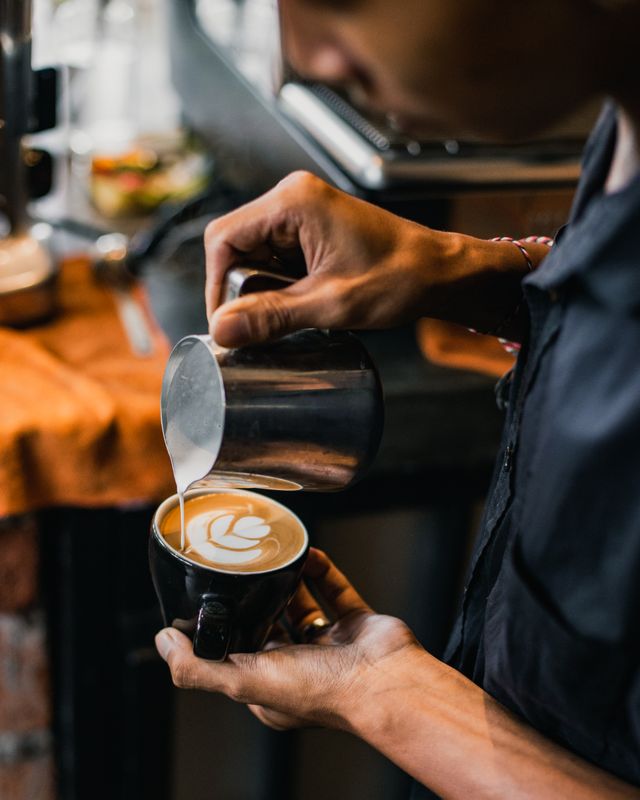 Barista preparing a customized drink