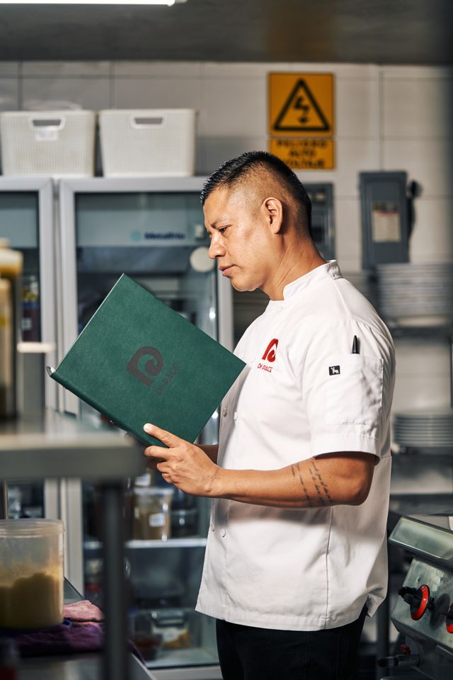 Café staff managing stock and supplies